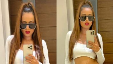 Know the boss! Nia Sharma is preppy hot in all white pantsuit, bold cherry red lips and celeb ponytail