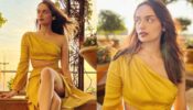 Manushi Chhillar looks incredibly boho-chic in a yellow cortina dress with a thigh-high slit outfit