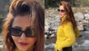 Watch: Rubina Dilaik basks under the mountain sun, pursues glam in olive green sweater top and cargo