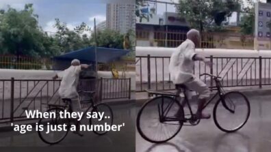 Viral Video: A Old Man Freely Enjoys Riding A Bicycle On A Wet Road Is Going Viral On Web