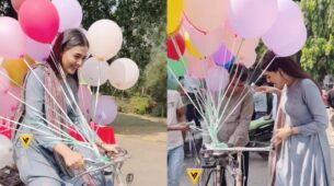 Viral Video: Tejasswi Prakash goes on cycle ride with balloon seller during shoot