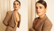 Radhika Madan Creates Oomph Look In All-Brown Bralette With Coat And High Slit Skirt