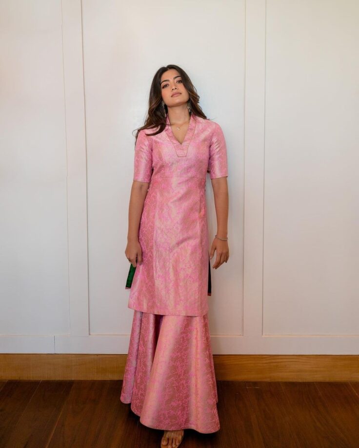 Rashmika Mandanna sported a pink silk brocade sharara outfit, while Keerthy wore a green floral one. Who do you think won the hearts, Rashmika or Keerthy? 772055