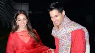 Watch: Sidharth Malhotra and Kiara Advani twin in red, distribute sweets after marriage