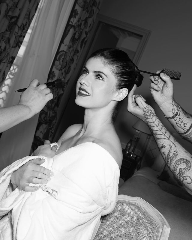 Alexandra Daddario Dresses Up In A Black Satin Corset Midi Dress 779359