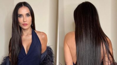 Demi Moore Pairs Classic Blue Halter-Neck Gown With Feather Jacket