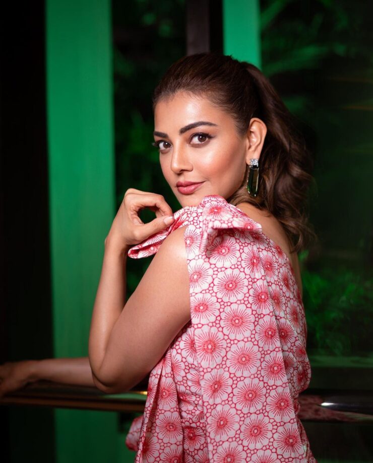 Kajal Aggarwal looks resplendent in latest body-hugging pink floral midi dress - 1