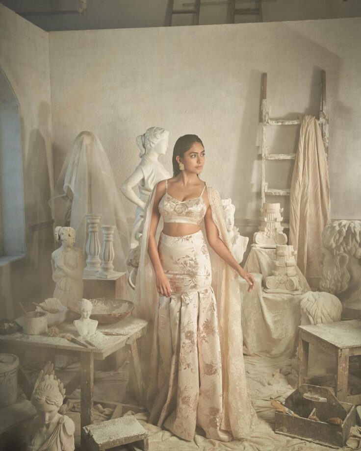 Mrunal Thakur Looks Like A Royal Princess In A Cream Colored Floral Printed Lehenga Set 783576