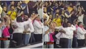 Awww! Abhishek Bachchan Pulls  Aishwarya Rai Bachchan Close In A Viral Video