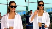 Kriti Sanon’s white bralette and unbuttoned shirt style is airport fashion goals