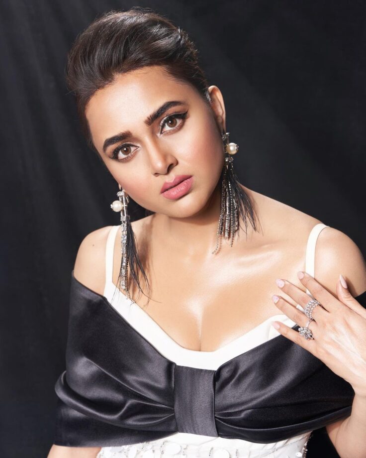 Tejasswi Prakash Shares Breathtaking Look In White Strappy Shimmery Gown - 4