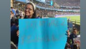 Fan Girl Creates Buzz at MI vs RCB Match with Dream Girl 2 Poster: Countdown to #PoojaKiKissOnAug25 Begins!