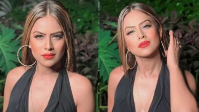 Nia Sharma, black v-neck slit dress, and red lipstick, a visual delight