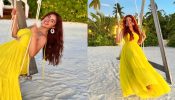 Ashnoor Kaur looks like a Blooming Sunflower in her latest Sunshine Yellow Halter Neck Dress.