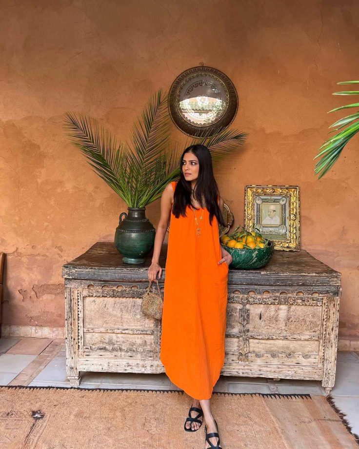 Malavika Mohanan can’t resist the candy-orange, this summer 812583