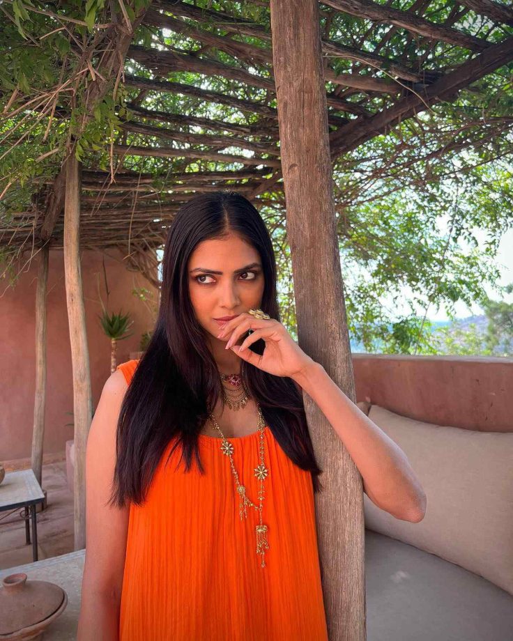 Malavika Mohanan can’t resist the candy-orange, this summer 812584