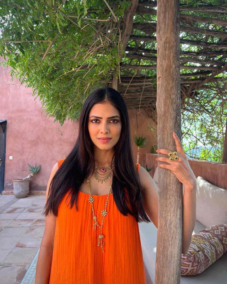 Malavika Mohanan can’t resist the candy-orange, this summer 812585