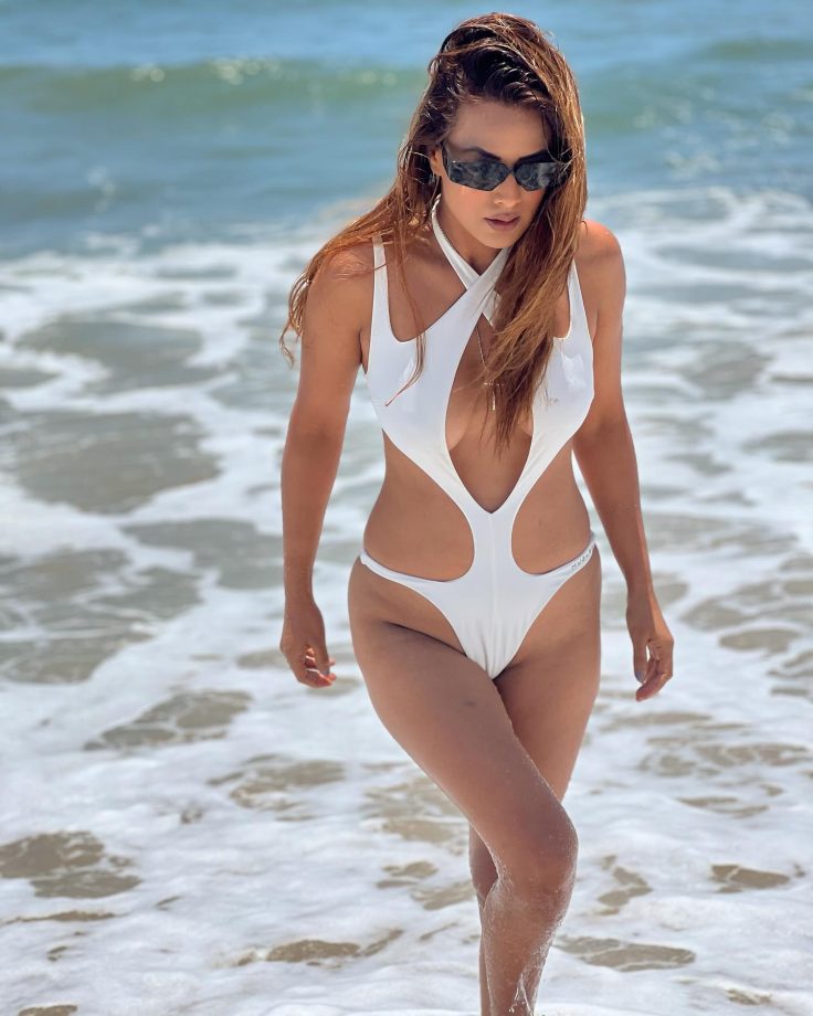 Nia Sharma Flaunts Hourglass Figure In White Monokini; Internet In Awe 819111