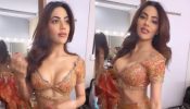 Nikki Tamboli burns sensuality quotient in orange shimmery deep-neck lehenga, we are crushing