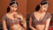 Nikki Tamboli is irresistible, bold and beautiful in deep-neck shimmery blouse and lehenga, come check out