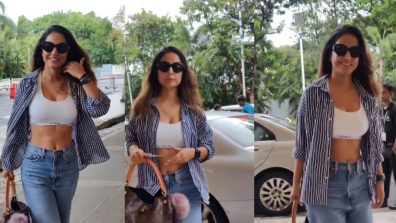 Boss Lady in action! Hina Khan stuns in striped unbuttoned shirt and baggy jeans at airport, watch