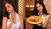 Palak Sindhwani keeps the spice up in white corset top, black pant and red bold lips