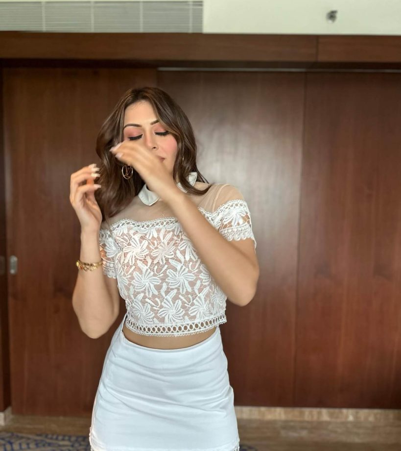 Hansika Motwani’s intricate floral designed white crop top and mini skirt look perfect for a cosy day out 845339