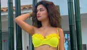 Avneet Kaur summons ‘swim’ ‘sunny’ n ‘sensuality’ in yellow bikini top and tropical wrap skirt 