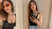 In Photos: Vaani Kapoor Spreads Casual Charm In Black Low Neckline Top And Ripped Denim