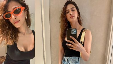 In Photos: Vaani Kapoor Spreads Casual Charm In Black Low Neckline Top And Ripped Denim