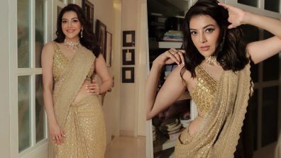 Kajal Aggarwal shines in her heavy embellished gold saree and plunge neck blouse design