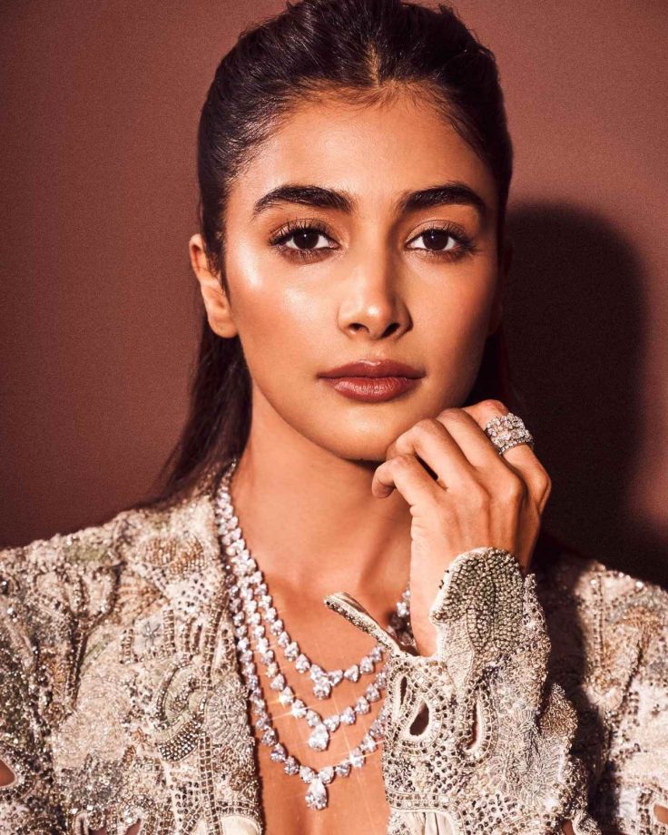 [Photos] Pooja Hedge Radiates Charm In Sparkling Silver Plunge-neckline Blazer And Trouser With Statement Accessories 851325