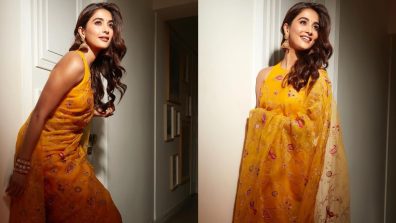 Pooja Hedge Shines In Floral Yellow Silk Saree And Halter-neck Blouse Design With Gold Jhumkas