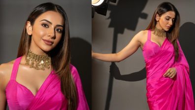 Rakul Preet Singh Poses In Pink Satin Saree, Halter Neck Blouse And Statement Necklace