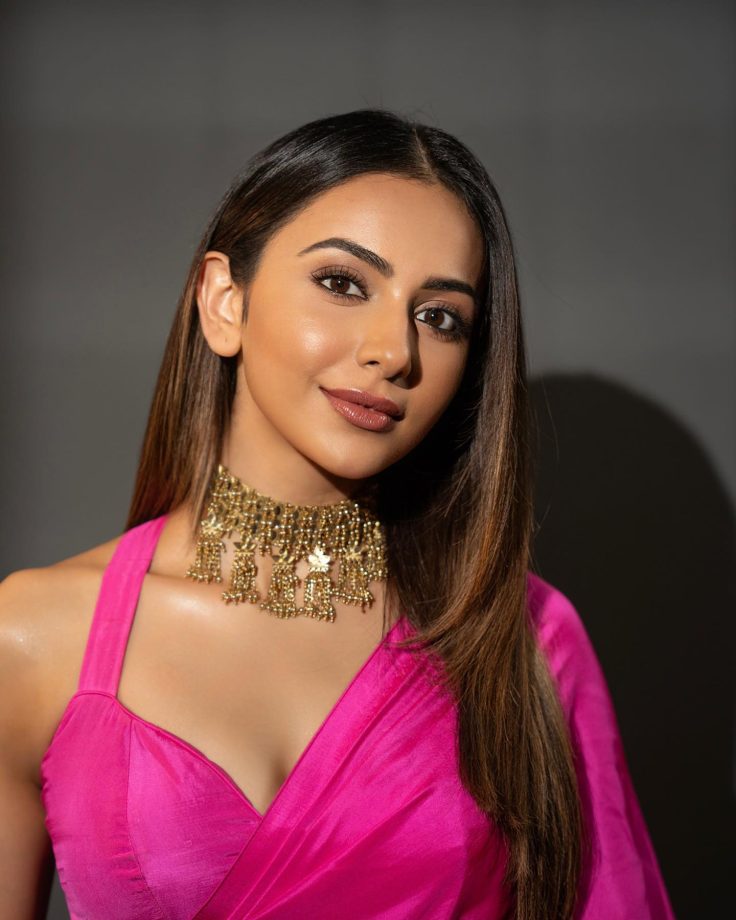 Rakul Preet Singh Poses In Pink Satin Saree, Halter Neck Blouse And Statement Necklace 855608