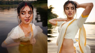 In Photos: Priya Varrier Looks Sizzling In Traditional White Saree As She Poses Inside Lake