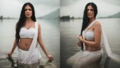 Malavika Mohanan Goes Fearless Posing Inside Lake, See Now