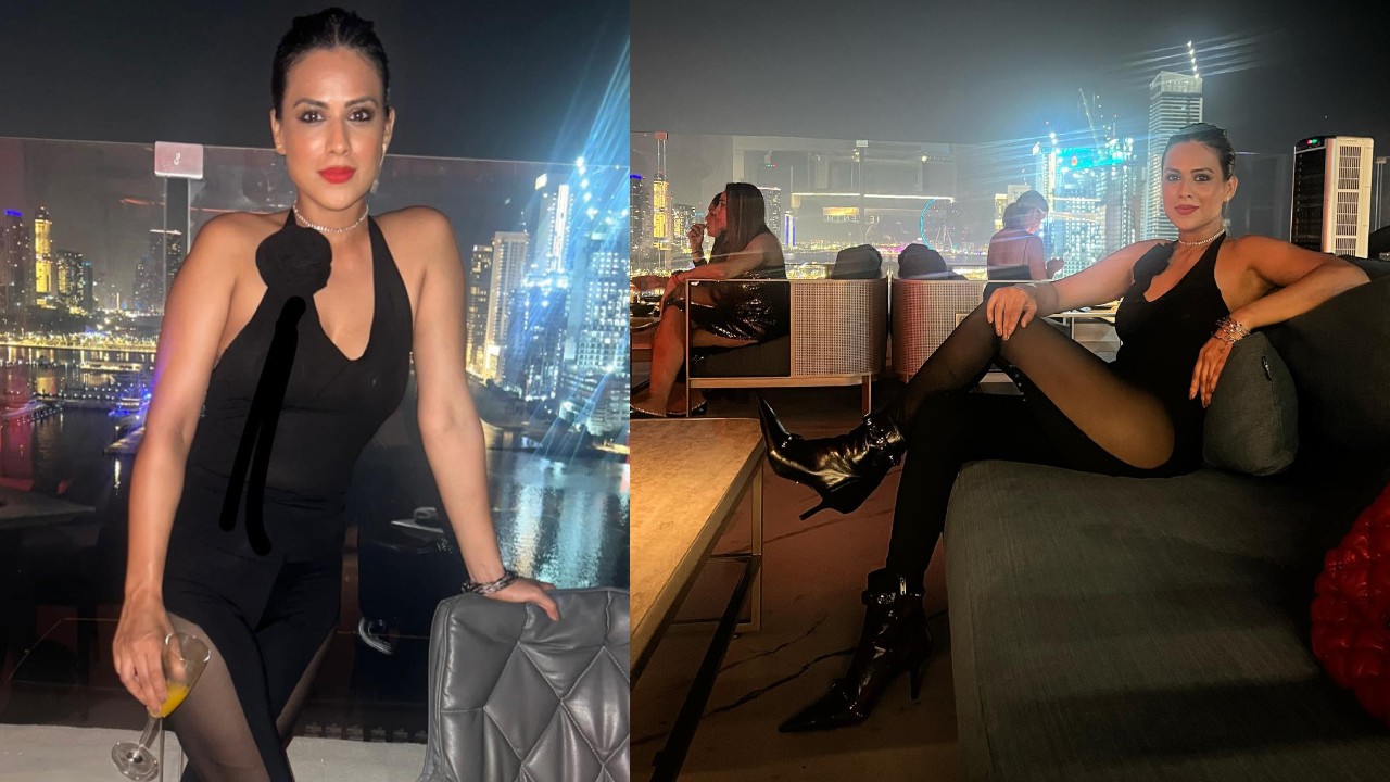 Mid-week Party Hotness: Nia Sharma Dons Black See-through Jumpsuit With Bold Red Lipstick Shade 860505