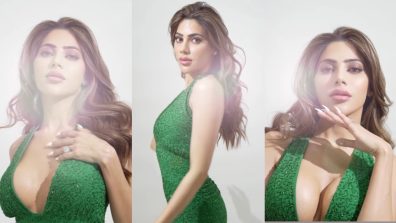 Nikki Tamboli decks up in daring plunge neck glittery green bodycon dress [Video]