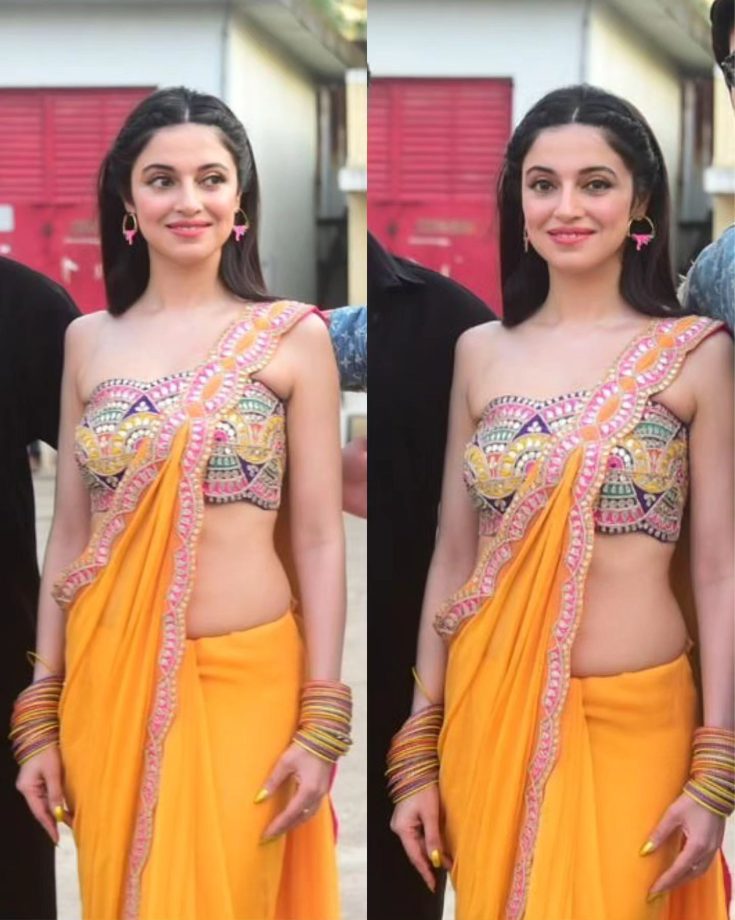 [Photos] Divya Khosla Kumar Makes Heads Turn In Yellow Saree With Sensuous Blouse Design 860430