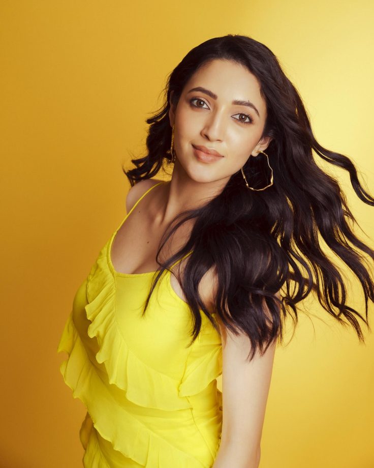 Razzle n dazzle! Neha Shetty blooms in Rs. 10000 yellow strappy ruffle dress 863116