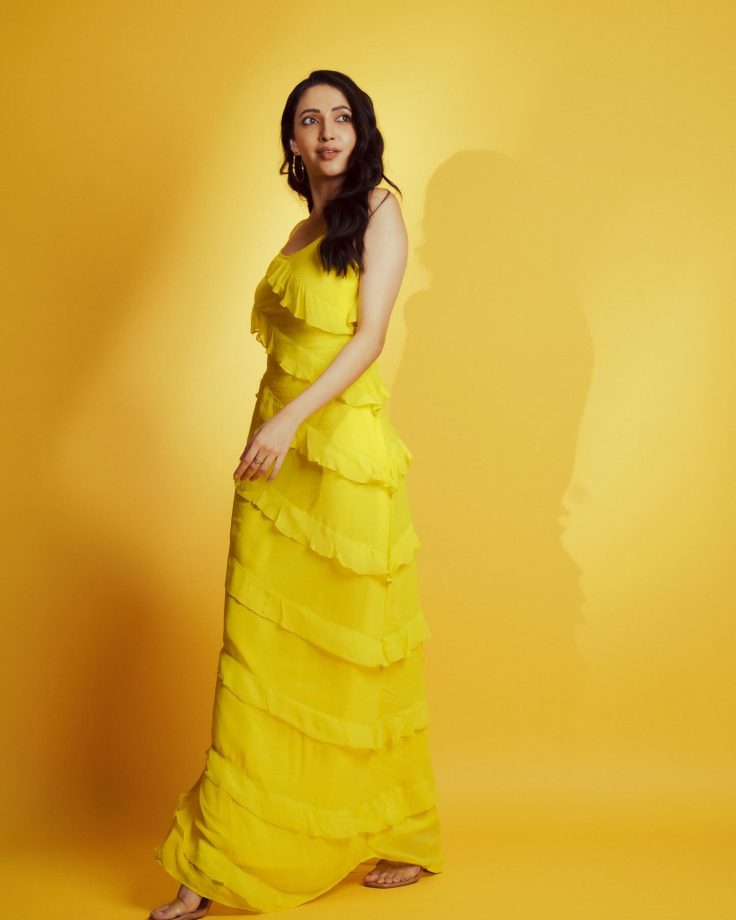 Razzle n dazzle! Neha Shetty blooms in Rs. 10000 yellow strappy ruffle dress 863117