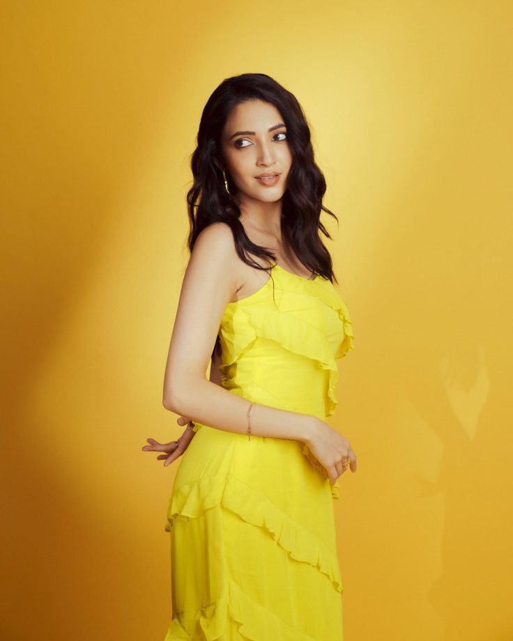 Razzle n dazzle! Neha Shetty blooms in Rs. 10000 yellow strappy ruffle dress 863118