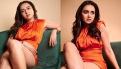 Tejasswi Prakash goes all ‘shine n sensuous’ in Rs. 24,500 orange playsuit [Photos]