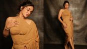 Wamiqa Gabbi shines in Rs. 38,500 gold halter top & EZ sari [Photos]