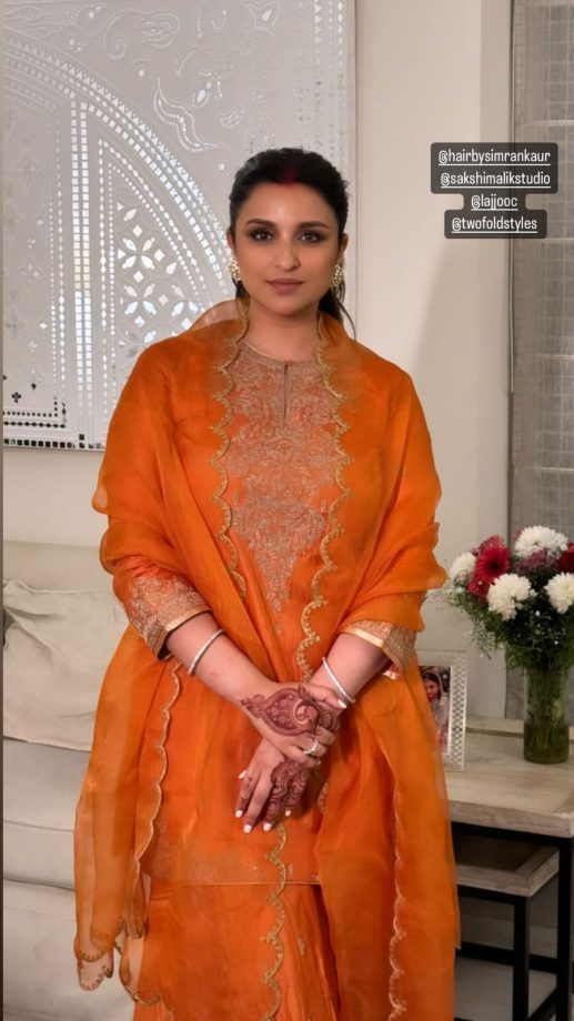 “Diwali Begins,” Parineeti Chopra blooms in orange silk embellished sharara set [Photos] 866984