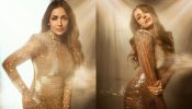 Malaika Arora plays sequin siren in golden embellished high-thigh slit gown