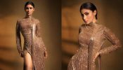 Mouni Roy goes all shine in golden embroidered high-thigh slit gown