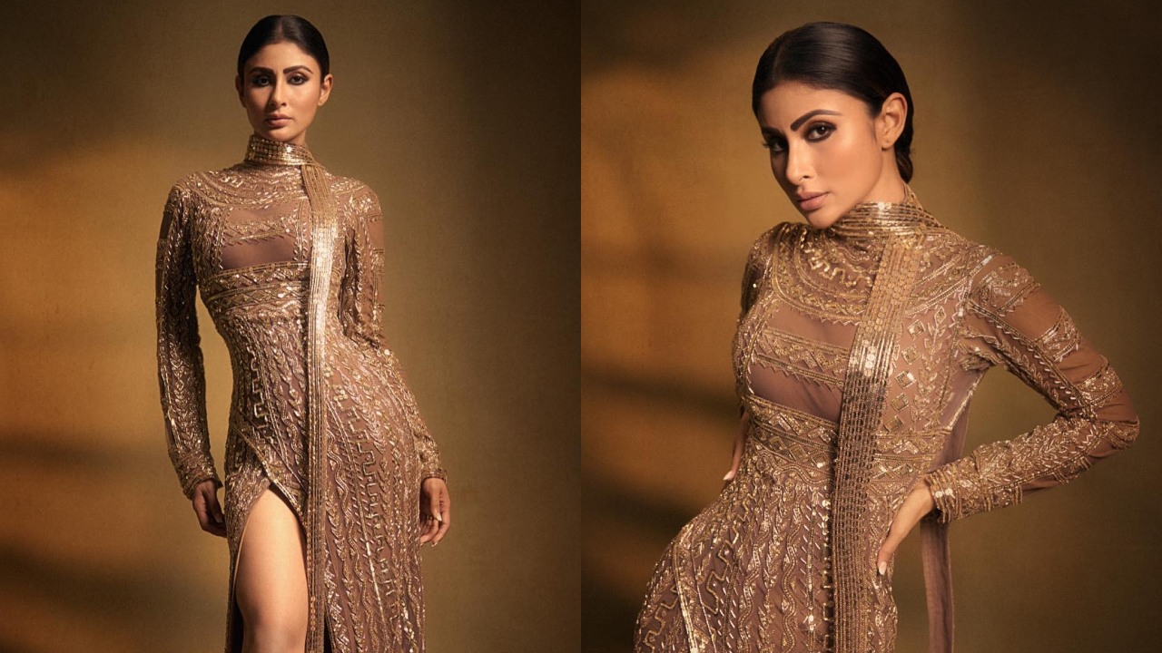 Mouni Roy goes all shine in golden embroidered high-thigh slit gown 870357