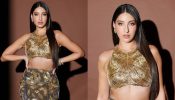 Nora Fatehi picks up festive fizz in fishtail lehenga choli and shimmery crop top blouse